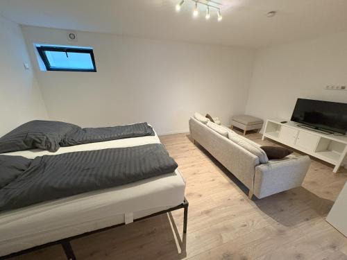 Bad Oldesloe Apartment | Modernes 2 Zimmer Souterrain Apartment - zentral - nahe Hamburg & Lübeck