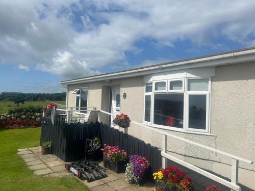 Annalong House | Moneydarragh Cottage with uninterrupted mountain and sea views- Hot tub available for hire