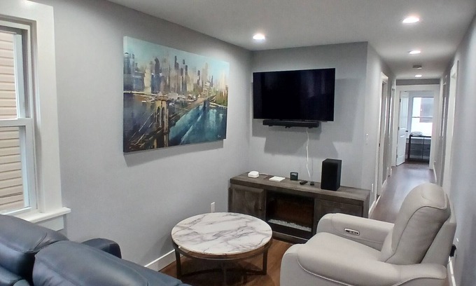 Ampere Apartment | Monthly Stays: 2BR apartment 8 Min Walk from NJ Transit Train to NYC