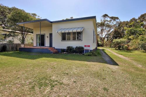 Hat Head House | Mullers Cottage at Hat Head - 25 Straight Street