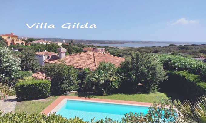 Punta De Su Turrione Villa | Multi-level villa with private garden and pool, sea view and air conditioning.