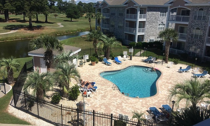 Central Myrtle Beach Condo | Myrtlewood 2BR 1st Floor, end unit, WiFi, pool, Cal Ripken & Oct renters welcome