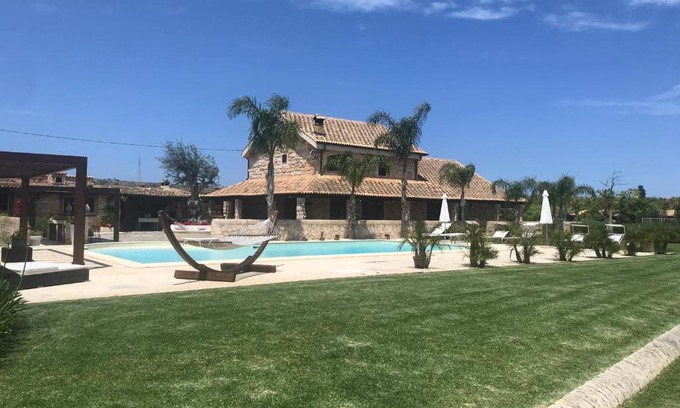 Syracuse House | Mythos Holidays & Events