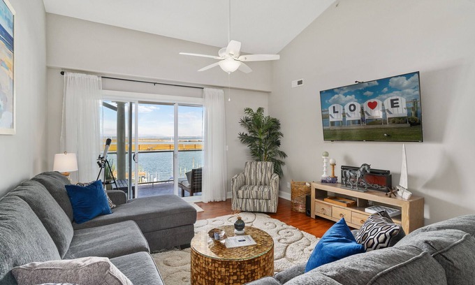 Chincoteague Condo | Nauti Girl - Sunset Bay Villa 310 - Waterfront, Pool, Boat Slip, Dog Friendly!