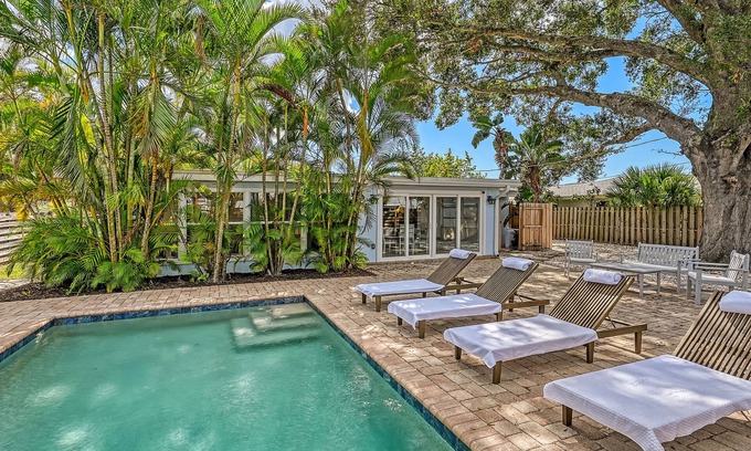 Southgate House | Near Siesta Key Beach, this Boho chic Sarasota pool home will feel like an oasis