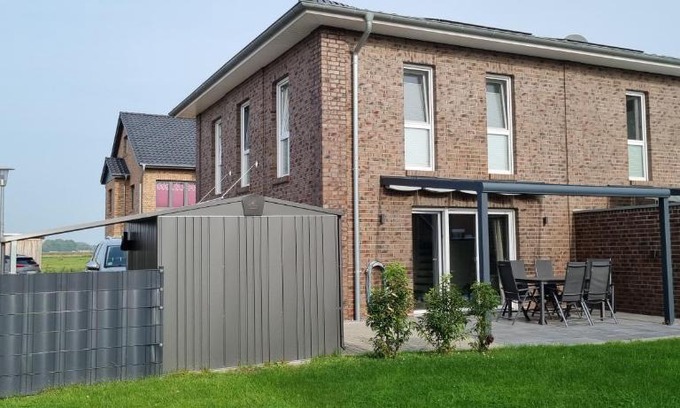 Nordseebad Burhave House | NEU!Moderne, lichtdurchflutete DHH, zentral, Garten, Wallbox, WLAN