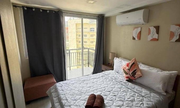 Cebu Condo | New 2-bedroom condo with WiFi & Netflixn2 minutes walk to Ayala Mall