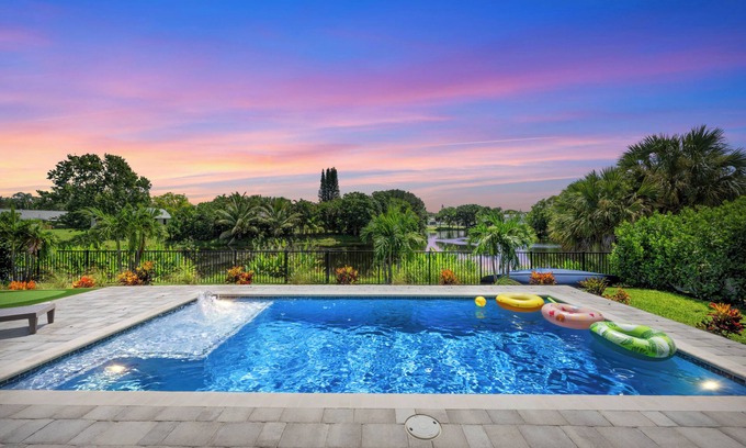 Jensen Beach House | New Construction Lakefront Home with Mini Golf Course, Heated Saltwater Pool!