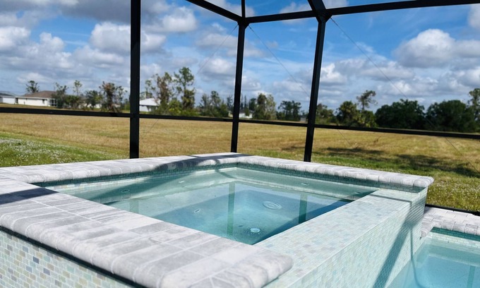 Jacarandas House | New heated pool/spa overlooking natural florida preserve.