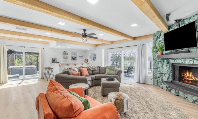 Commerce Township House | NEW Lake Front W/Private Dock, Hot Tub & Sauna!