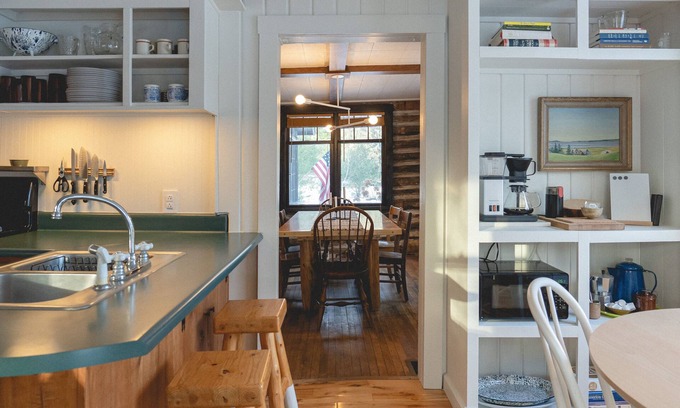 Alanson House | NEW! Log cabin retreat w/modern updates sleeps 14