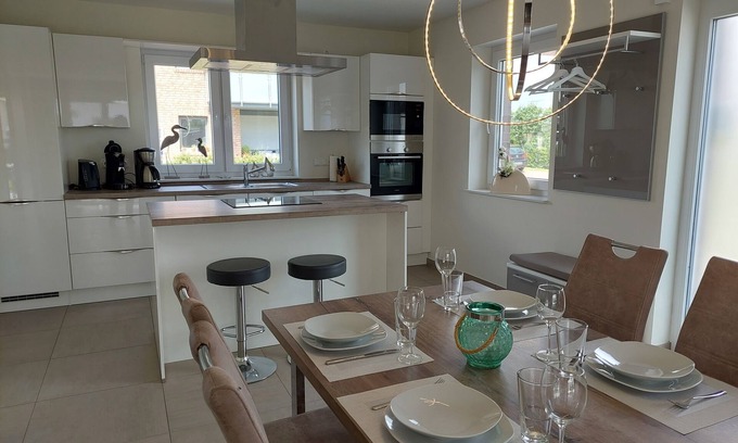 Nordseebad Burhave Apartment | NEW! modern, high-quality, central apartment, with sauna, garden, wallbox in Burhave