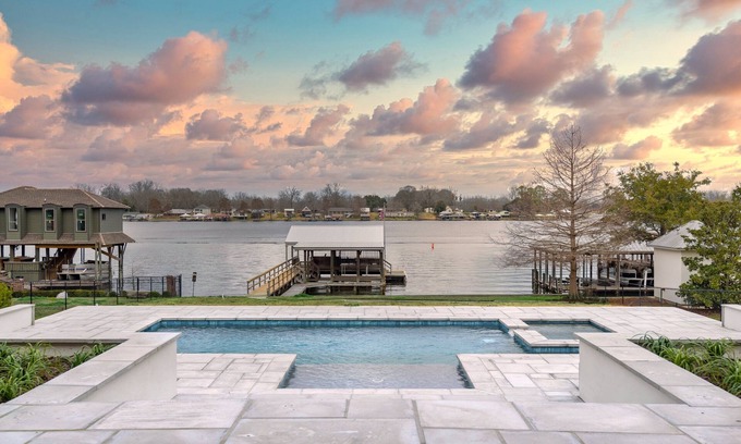 Oscar House | New on the rental market! Lakefront on False River with private dock and pool