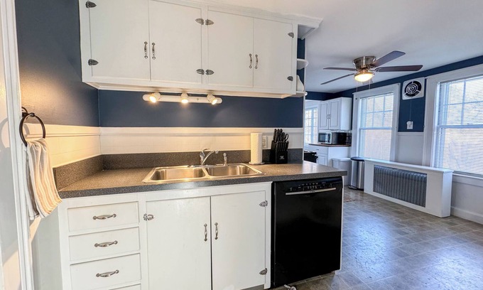Manchester Apartment | NEW - Private Patio - 1st Floor - Mins to Downtown - Hospitals - Explore NH