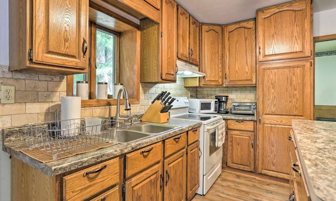 Tunkhannock Township House | NEW! Secluded Pocono Lake Home: Fire Pit & Hot Tub