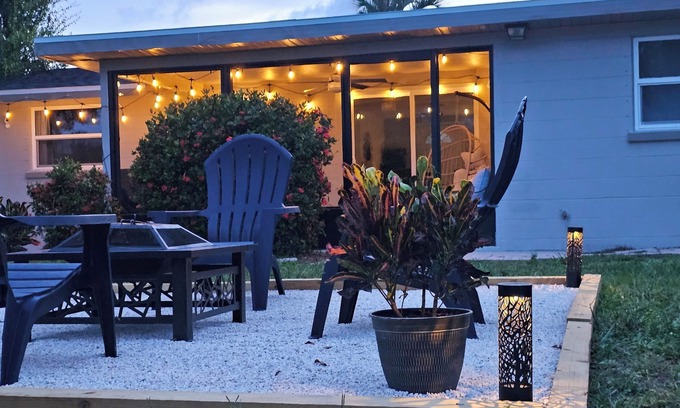 Englewood South House | NEW! Tropical Retreat Cozy Patio ~3 miles to Beach Firepit Wi-Fi A/C