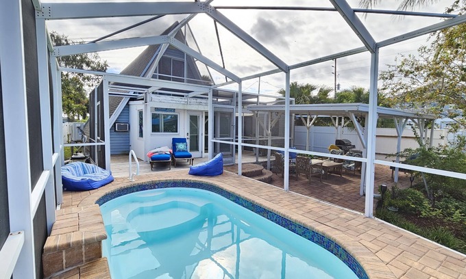 Spring Hill House | NEW - Waterfront A Frame - Screened In Pool - Pet Friendly - Private Dock