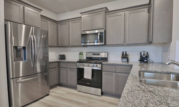 Wellborn House | Newly built home in south College Station with comfortable beds and free WiFi!