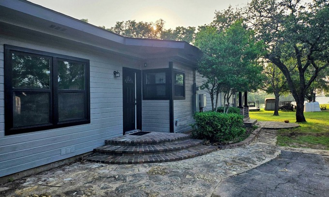 Whitney House | Newly Renovated 1.5 Acre Lake Front Home with Game Room and Direct Lake Access.