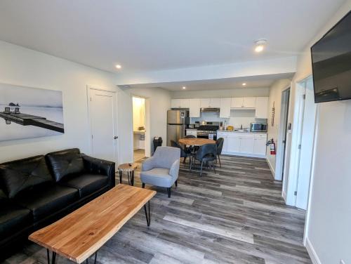 Drummond-North Elmsley House | Newly Renovated 2 Bedroom Beach Front Condo 3A