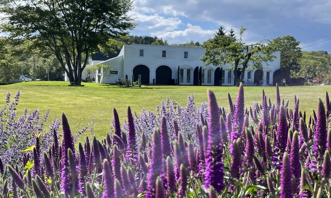 Bayville House | Newly Renovated Carriage House surrounded by water and lush gardens.