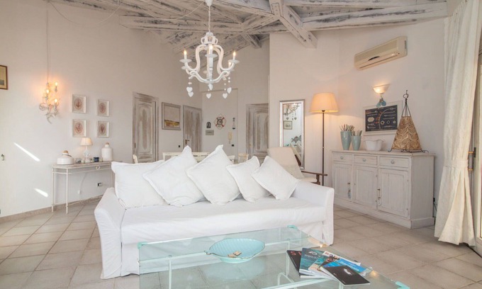 Baia Caddinas Apartment | Nice apartment for 4 guests with WIFI, pool, A/C, TV, terrace and parking