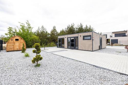 Lichterfeld-Schacksdorf House | NORA Stays Tiny House mit Seeblick - Sauna - Klima