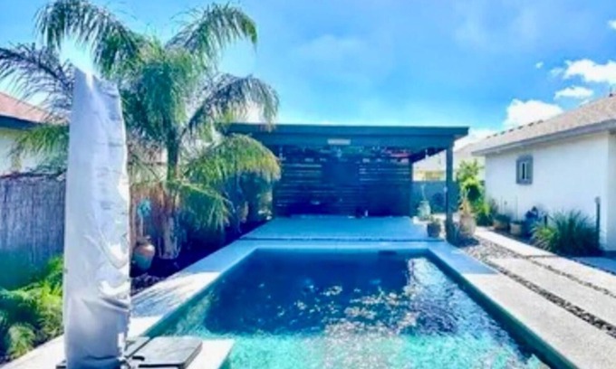 Brownsville House | North Brownsville home with pool and pergola.nBeautiful backyard oasis feeling.