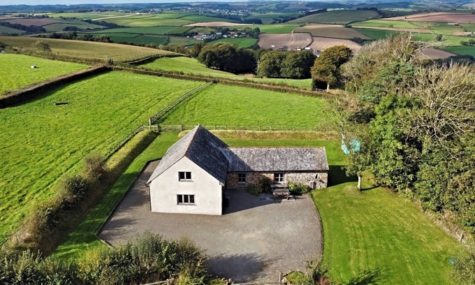 Ash Mill House | North Devon Countryside Escape. Dog friendly with views, large garden & paddock.
