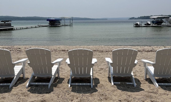 Leland Cottage | North Lake Leelanau carriage/cottage. Sandy beach front on North Lake Leelanau.