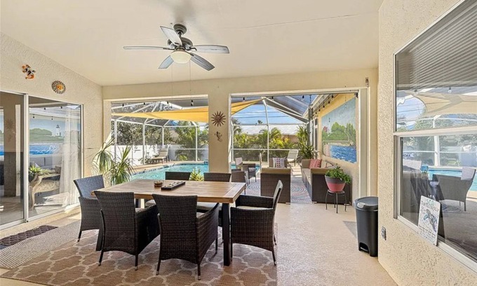 Pelican House | Oasis: 3-bedroom house with POOL and beautiful Screened back patio in Cape Coral