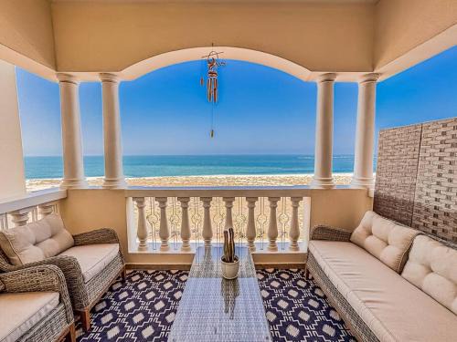 Al Hamra Village Apartment | Ocean Breeze Retreat