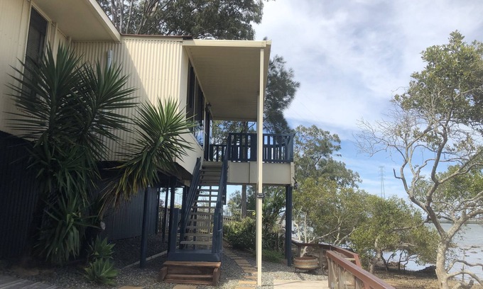 Brisbane Waterfront House | Ocean Front Paradise. Fish off the Deck.