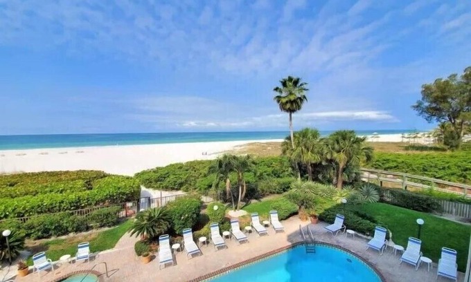 St. Pete Beach Condo | 🌊 Oceanfront Elegance with Walkout Balcony