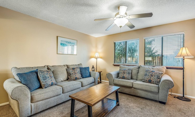 Sugar Beach House | Oceanfront townhouse near beach with pool, balcony, central AC, & washer/dryer