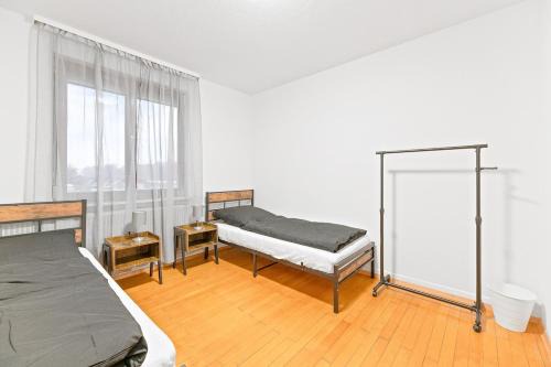 Ofterdingen Apartment | OF02 Komfortables Apartment für Monteure und Teams - 4 Schlafzimmer mit 10 Einzelbetten - LS Crewcomfort - weitere Unterkünfte verfügbar