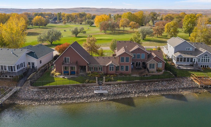 Pierre Cabin | One-Of-A-Kind 5,100 Sq. Ft. Waterfront Property by Pierre w/ Riverside View!
