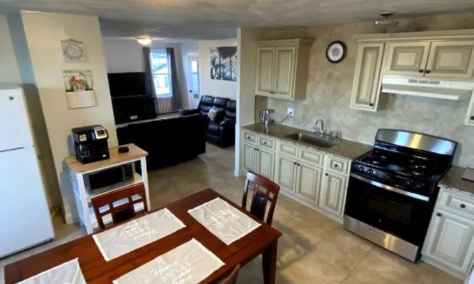 Gloucester Apartment | Open concept, 2-level apartment with scenic view