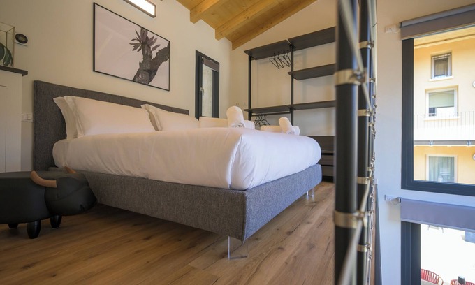 Crociale Apartment | Open space on two floors in detached cottage in ancient medieval courtyard