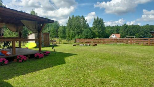 Szczytno House | Otulony słońcem - domek do wynajęcia Marksewo
