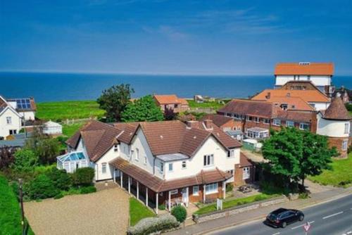 Mundesley House | Overcliff Lodge, Mundesley sea view, sleeps 22