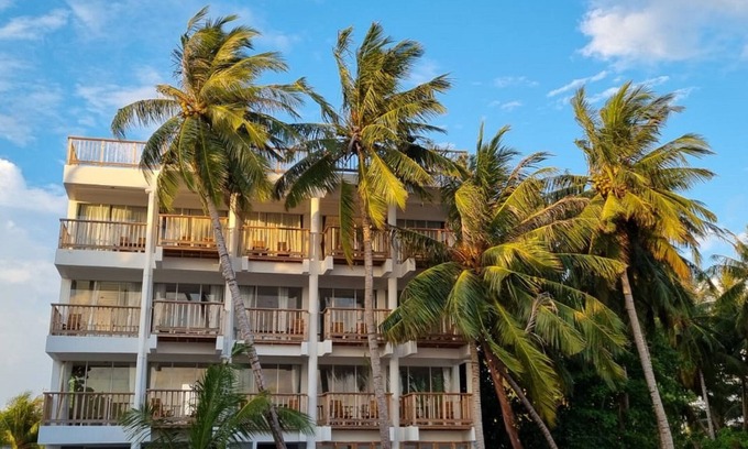 Thulusdhoo Island House | Overlooking ocean that meets cloudless sky, Coral Inn is a sanctuary of serenity