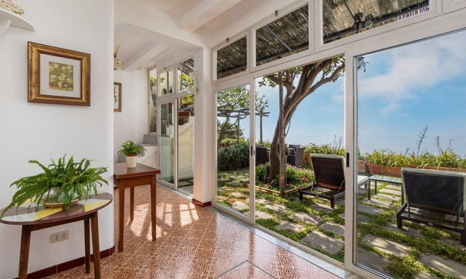 Liparlati House | Overseas Glimpse - Patio overlooking the Sea