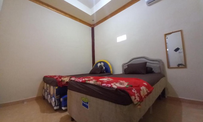 Bailangu Hotel | OYO 90731 E-kreasi Home