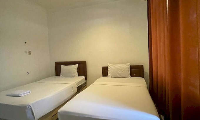 Medan Hotel | OYO 92463 Deli Hotel Medan