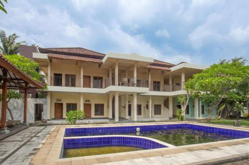 Kecamatan Kuripan Hotel | OYO 93440 Warde Hotel Near Sae Restaurant