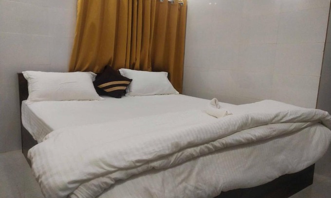 Auli Hotel | OYO Lemon Wood Near Lulu Mall