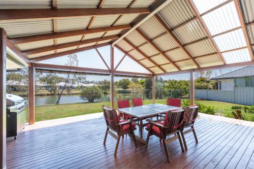 Yamba House | Oyster Cove Sunset - LJ Hooker Yamba