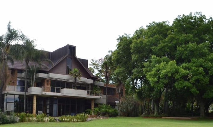 Waparand Villa | Palm Villa Room1 Exclusive en-suite room with private Patio on ground floor