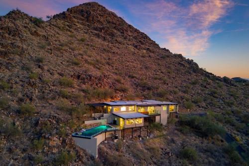 Turquoise Hills House | Panoramic Views Private Pool Patio Lounge w Firepit Royal Palm by AvantStay